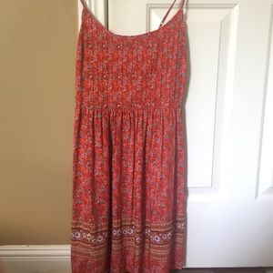 orange redish strap dress with flower print